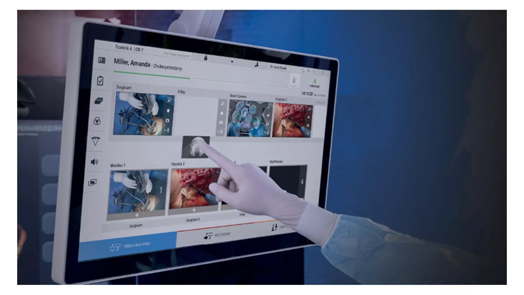 Surgeon's hand drags an X-ray image into a patient profile on a digital screen